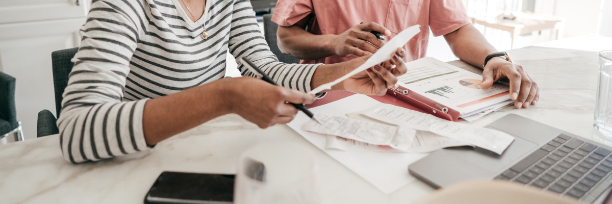 Couple looking at receipts and paperwork together