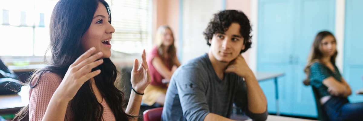 Hispanic student speaks in class