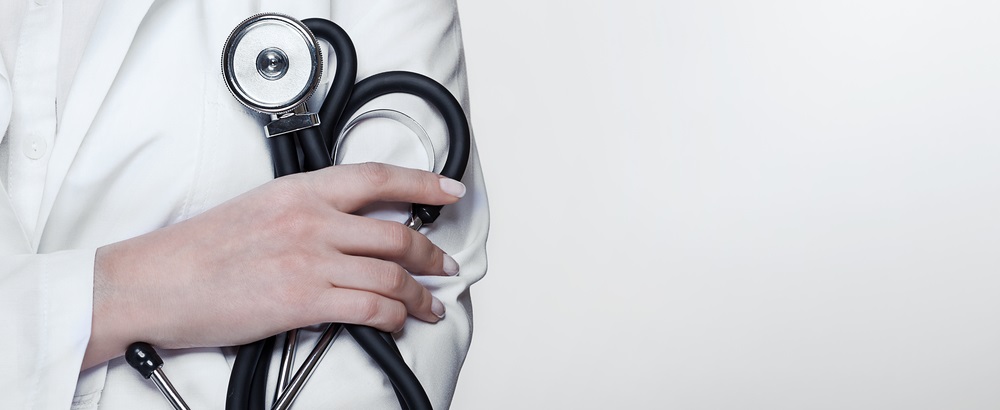 dr holding stethoscope