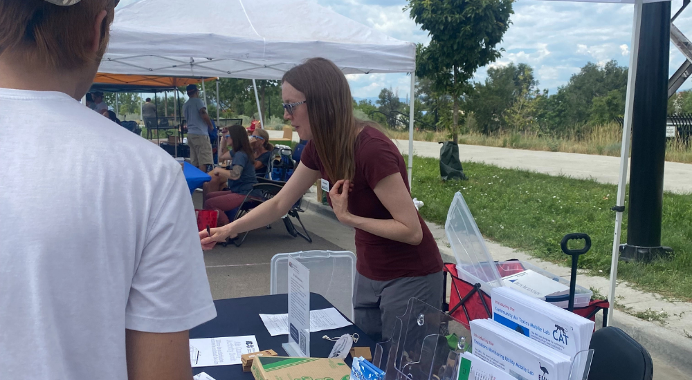 Air division staff handing out information at a tabling event