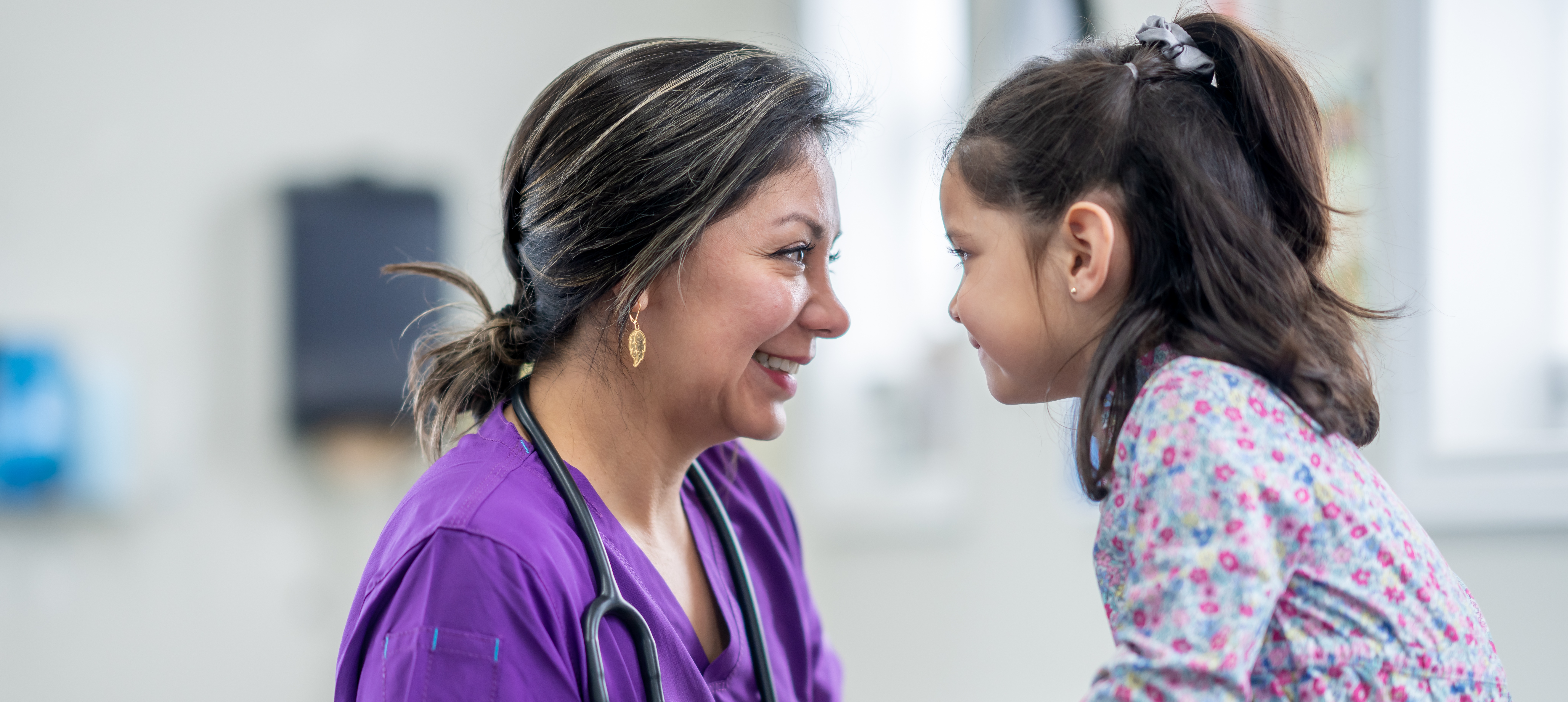 health care worker and young girl