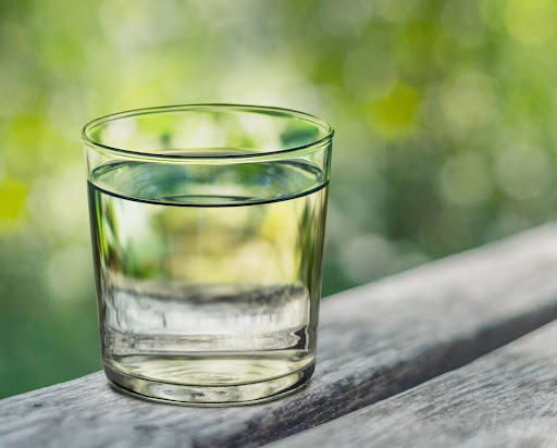 Small glass of water.