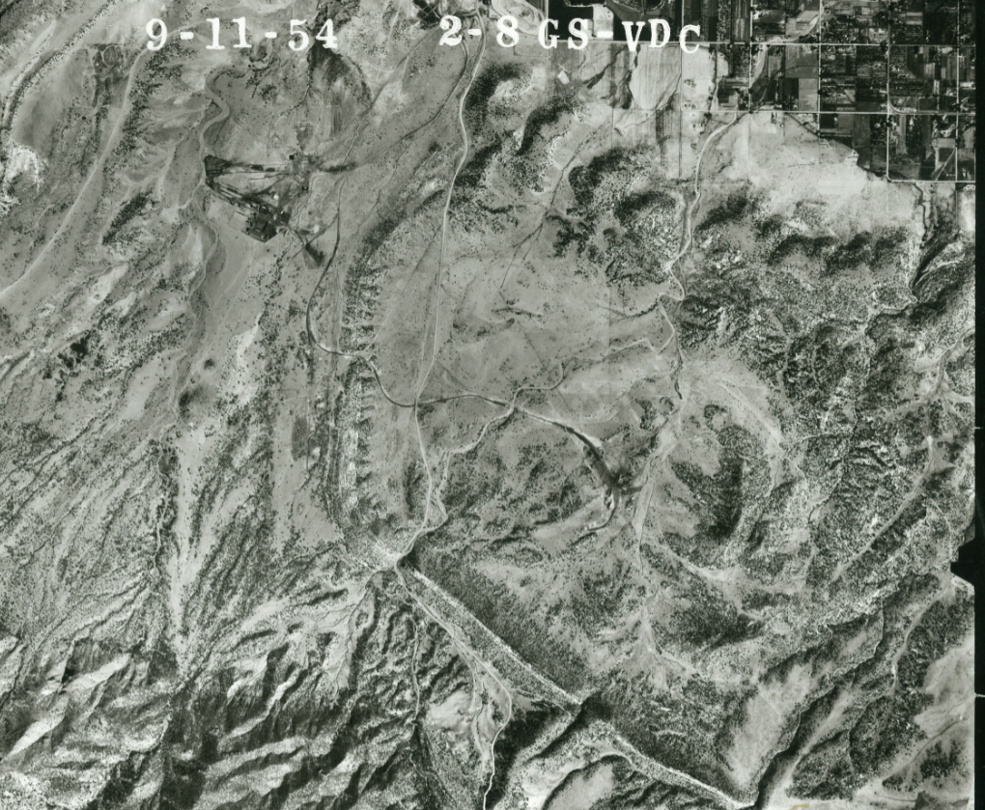 September 1954 -  aerial view of site activities prior to the involvement of Cotter Corp., including mining, smelting, and railroad infrastructure.
