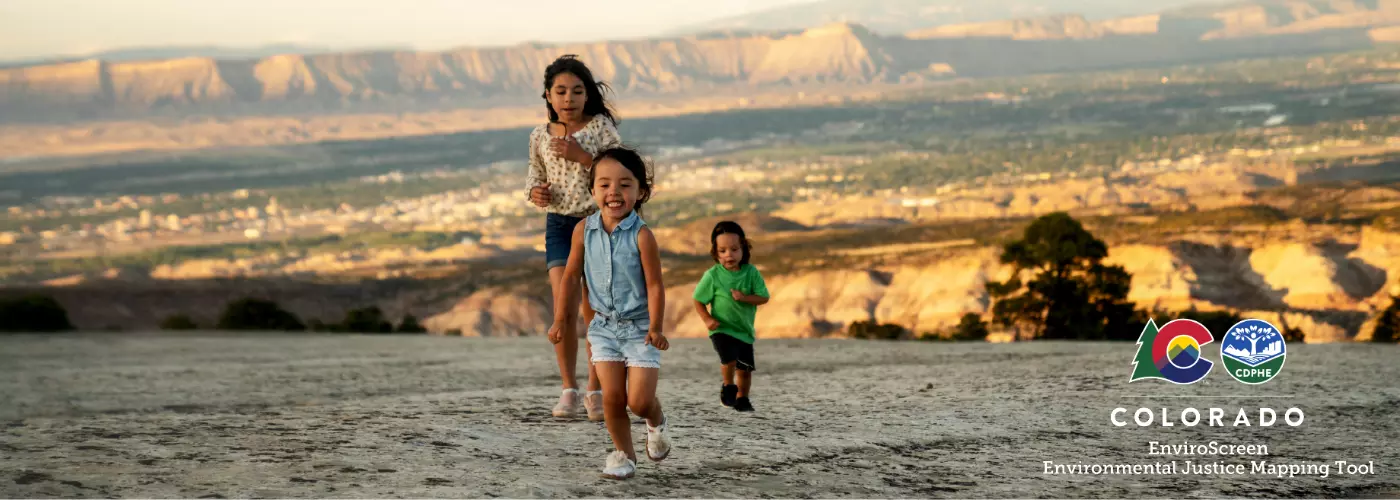 Children running on a Colorado mesa