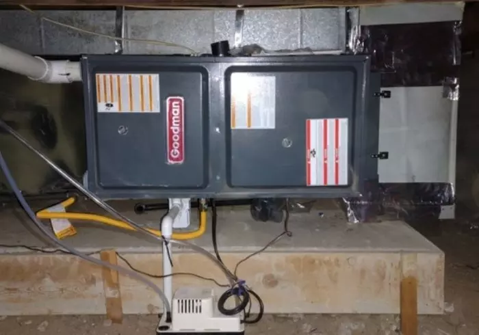 Furnace on pad in a house