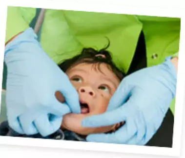 Child getting dental checkup