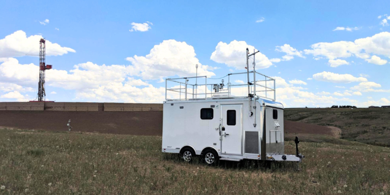 Colorado Air Monitoring Mobile Lab, or CAMML, trailer parked in rural Colorado with sampling intakes visible on the roof